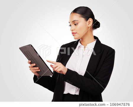Studio, woman and lawyer working with tablet for online news, research and work information on website or white background. Reading, mobile app and typing law notes, report or email feedback Studio, woman and lawyer working with tablet for online news, research and work information on website or white background. Reading, mobile app and typing law notes, report or email feedback 106947876