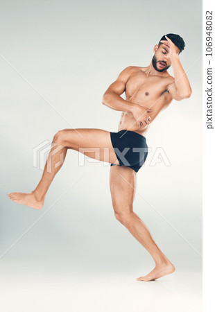 Health, fitness and body of a man in studio for health, wellness and self care motivation for a healthy lifestyle. Strong aesthetic model in underwear for exercise, training and workout goals 106948082