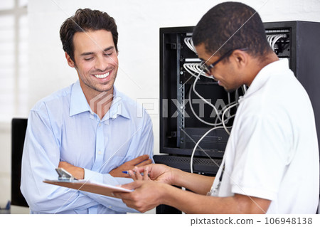 Server room, happy man or technician speaking of hardware maintenance or glitch in business office. Network, tech support or worker with electrician or electrical engineer for information technology 106948138