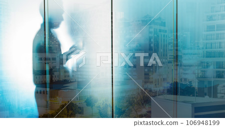 Glass, silhouette and businessman with city overlay in office, writing and thinking, goal and strategy. Double exposure, shadow and man entrepreneur planning, creative and motivation for innovation 106948199