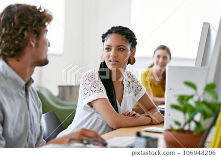 Journalist, computer or people in office talking or speaking of digital business or research project. Woman, discussion or employees in conversation about on online blog reports or internet article 106948206
