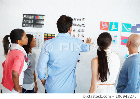 Theres no better work than teamwork. Shot of a group of casually dressed businesspeople in the office. 106948273