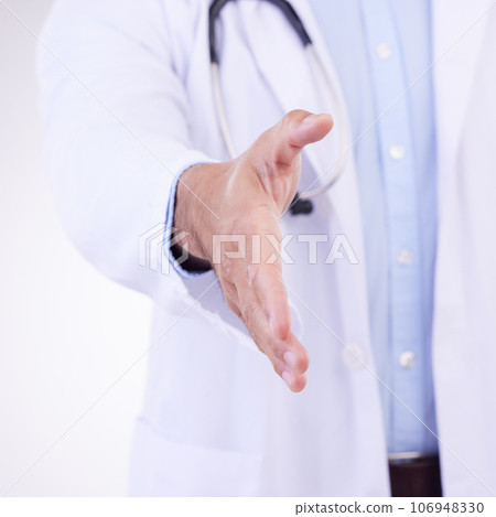 Doctor, man and handshake for healthcare partnership, meeting or greeting against a white studio background. Hand of isolated male medical professional shaking hands for introduction or thank you Doctor, man and handshake for healthcare partnership, meeting or greeting against a white studio background. Hand of isolated male medical professional shaking hands for introduction or thank you 106948330