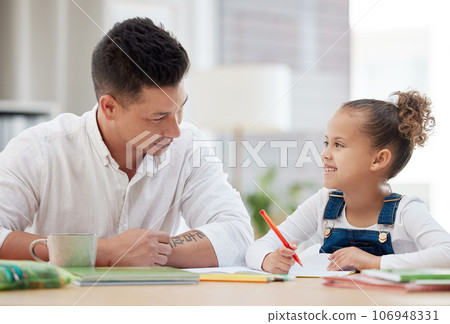 Dads the best teacher. a young father helping his daughter with her homework at home. Dads the best teacher. a young father helping his daughter with her homework at home. 106948331