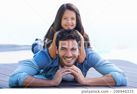 Love, relax and floor portrait of happy family father, child or people smile for Fathers day quality time together. Support trust, childhood and young kid, girl or youth bonding with dad, papa or man 106948335