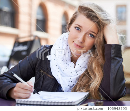 Creative, portrait and student drawing in the city on a notepad for an art college assignment. Happy, smile and young female artist sketching a picture in a book for university project in urban town. Creative, portrait and student drawing in the city on a notepad for an art college assignment. Happy, smile and young female artist sketching a picture in a book for university project in urban town. 106948393