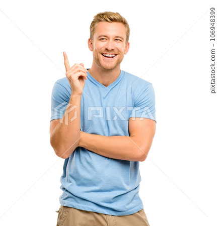 Thinking, pointing and a man laughing in studio for announcement, presentation or choice. Happy male model with hand gesture or sign for advertising, promotion or funny idea on a white background 106948399