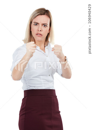 Portrait, fight and woman with anger, fist and person isolated on white studio background. Young female employee, lady and gesture for fighting, argue and angry with attitude, warning and threatening 106948429