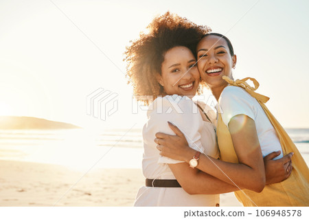 Portrait, lgbt couple hugging on the beach at sunset together for romance or bonding on a date. Mockup, love and a gay woman with her lesbian girlfriend by the sea or ocean for honeymoon vacation 106948578