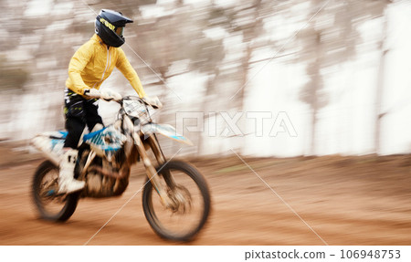Bike, speed and motion blur with a sports man on space in the forest for dirt biking. Motorcycle, fitness and power with a person driving fast on an off road course for freedom or performance Bike, speed and motion blur with a sports man on space in the forest for dirt biking. Motorcycle, fitness and power with a person driving fast on an off road course for freedom or performance 106948753
