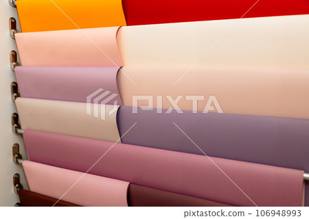 many rolls of wrapping paper or film for gifts and packing bouquets (wallpaper) many rolls of wrapping paper or film for gifts and packing bouquets (wallpaper) 106948993