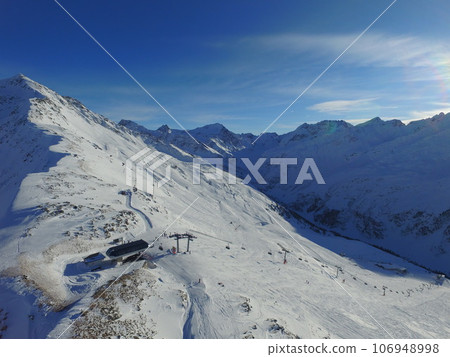 Mountain, snow and the Swiss Alps in winter for travel, holiday or vacation with a view of nature. Environment, landscape and adventure in a remote location during the cold weather season in Europe Mountain, snow and the Swiss Alps in winter for travel, holiday or vacation with a view of nature. Environment, landscape and adventure in a remote location during the cold weather season in Europe 106948998