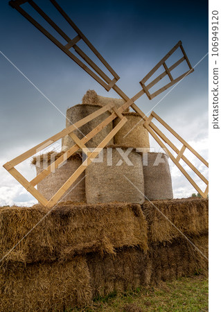 decorative mill from straw bales in the field decorative mill from straw bales in the field 106949120