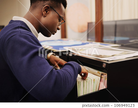 School research, campus and a black man in a library for knowledge, learning or studying. University, scholarship and a young African person or student looking at books for decision or choice School research, campus and a black man in a library for knowledge, learning or studying. University, scholarship and a young African person or student looking at books for decision or choice 106949123