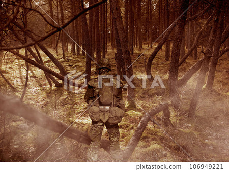 Military, army and soldier in forest with camouflage for mission, service or fight in woods with weapon, uniform and protection. Battlefield, warrior and person in camp for incognito and defence Military, army and soldier in forest with camouflage for mission, service or fight in woods with weapon, uniform and protection. Battlefield, warrior and person in camp for incognito and defence 106949221