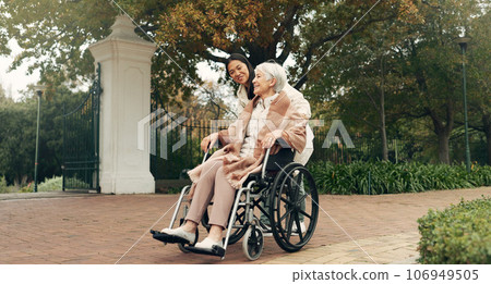 Senior woman, wheelchair and caregiver in park, nature or garden outdoor together. Happy, elderly person with a disability and walking for health, wellness and physical therapy for rehabilitation Senior woman, wheelchair and caregiver in park, nature or garden outdoor together. Happy, elderly person with a disability and walking for health, wellness and physical therapy for rehabilitation 106949505