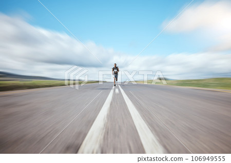 Fitness, energy and man runner in road for competition, running or workout in countryside. Sports, race and male athlete in street for training, exercise or speed, resilience or performance challenge Fitness, energy and man runner in road for competition, running or workout in countryside. Sports, race and male athlete in street for training, exercise or speed, resilience or performance challenge 106949555
