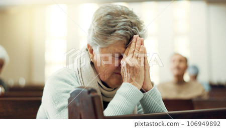 Worship, praying or old woman in church for God, holy spirit or religion in cathedral or Christian community. Faith, spiritual or elderly person in chapel sanctuary to praise Jesus Christ with hope 106949892