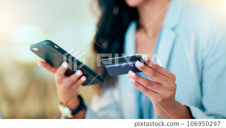 Bank card data put in phone by a lady who does internet banking by typing on her mobile to make an online credit payment. Young woman texting on her phone to send money via an ewallet transaction Bank card data put in phone by a lady who does internet banking by typing on her mobile to make an online credit payment. Young woman texting on her phone to send money via an ewallet transaction 106950297