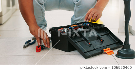 Repair, kitchen and man with box of tools for home construction, fixing and plumbing maintenance. Manual labor, DIY plumber and handyman pack equipment after working on sewer pipe, sink and plumbing Repair, kitchen and man with box of tools for home construction, fixing and plumbing maintenance. Manual labor, DIY plumber and handyman pack equipment after working on sewer pipe, sink and plumbing 106950460