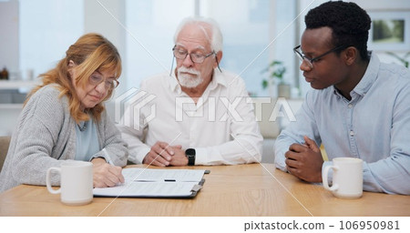 Senior couple, insurance and contract with financial advisor and retirement plan to sign. Document, pension and business analyst with information and paperwork in office for signature of will Senior couple, insurance and contract with financial advisor and retirement plan to sign. Document, pension and business analyst with information and paperwork in office for signature of will 106950981