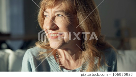 Happy, thinking and a senior woman on the sofa in a home living room for peace, calm and retirement. Smile, idea and an elderly person with a vision, hope and relax on the lounge couch of a house Happy, thinking and a senior woman on the sofa in a home living room for peace, calm and retirement. Smile, idea and an elderly person with a vision, hope and relax on the lounge couch of a house 106950983