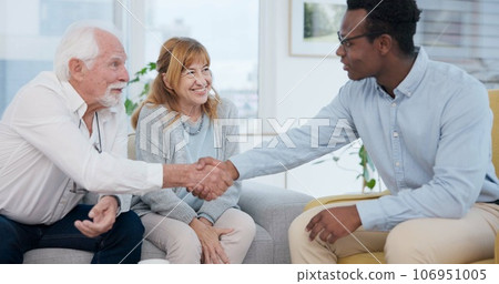 Senior, couple and handshake for life insurance planning and investment at a meeting. Finance, shaking hands and agreement deal for accounting and retirement budget for income savings with thank you Senior, couple and handshake for life insurance planning and investment at a meeting. Finance, shaking hands and agreement deal for accounting and retirement budget for income savings with thank you 106951005