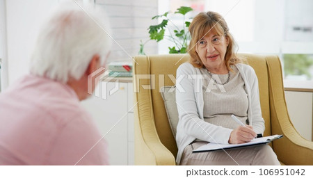 Writing, psychology and therapy with therapist and patient for counseling, support and meeting. Mental health, rehabilitation and advice with senior people in office for psychologist and checklist Writing, psychology and therapy with therapist and patient for counseling, support and meeting. Mental health, rehabilitation and advice with senior people in office for psychologist and checklist 106951042