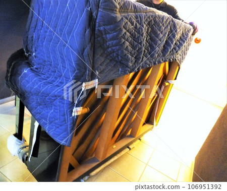 Transporting an upright piano Transporting an upright piano 106951392
