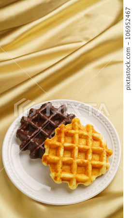 Gold background with waffles Gold background with waffles 106952467