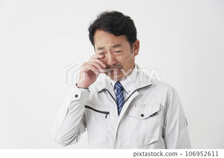 Crying worker white background Crying worker white background 106952611