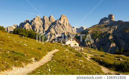 Trekking trail in Italian Dolomiti, Malga Langalm, Italy 106952808