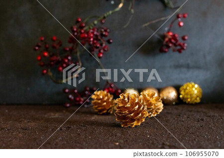 red berries and pine cones red berries and pine cones 106955070
