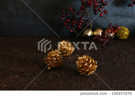 Christmas golden ornaments and nuts Christmas golden ornaments and nuts 106955076