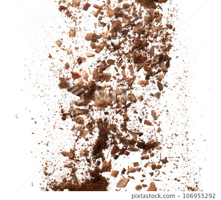 Coconut peel husk flying explosion, coconut chopped fine small S size fall down as dust. Coconut powder peel fertilizer splash throwing in Air. White background Isolated series two of images 106955292