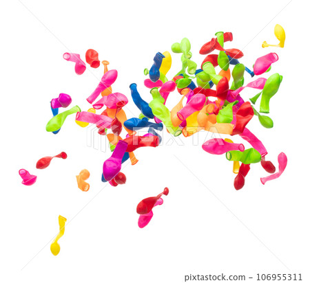 Deflated rubber colorful balloons fly in air. Many colorful deflated balloons in red, blue, yellow throw scatter. Toy for kid to play in birthday party and celebrate, white background isolated 106955311