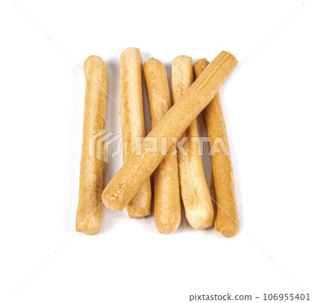 Crispy bread sticks on white background 106955401