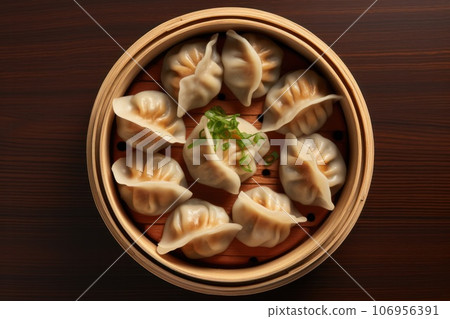Dumplings Wooden in a bamboo box Dumplings Wooden in a bamboo box 106956391