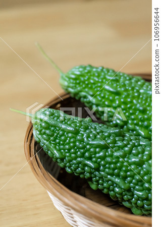 Bitter gourd harvested from a home garden 106956644