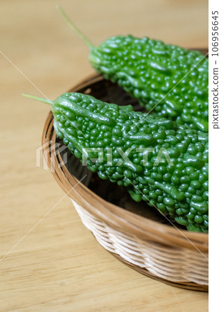 Bitter gourd harvested from a home garden 106956645