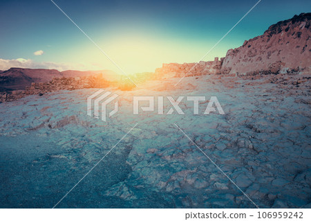 Sunrise over Masada fortress. Ruins of King Herod's palace in the Judaean Desert 106959242