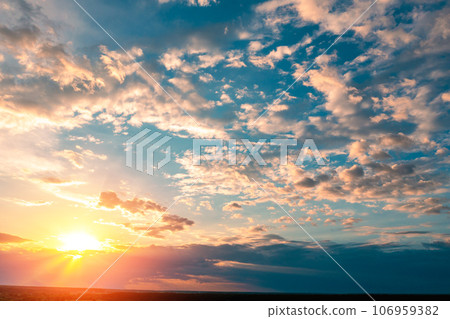 Colorful cloudy sky at sunset. Gradient color. Sky texture. Abstract nature background 106959382