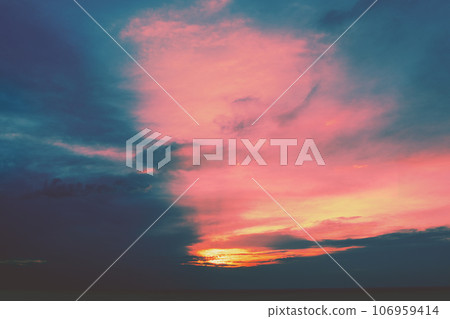 Dramatic cloudy sky at sunset. Sky texture. Abstract nature background Dramatic cloudy sky at sunset. Sky texture. Abstract nature background 106959414