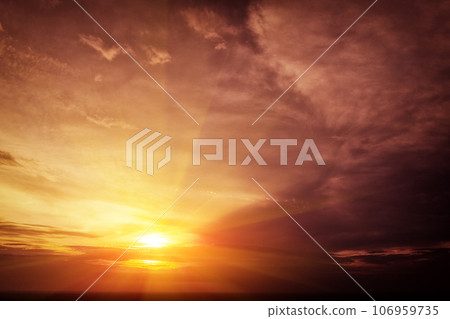 Colorful cloudy sky over the sea at sunset. Sky texture. Abstract nature background Colorful cloudy sky over the sea at sunset. Sky texture. Abstract nature background 106959735