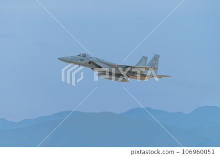 Air Self-Defense Force 303rd Squadron F-15J Eagle flying over the mountains Air Self-Defense Force 303rd Squadron F-15J Eagle flying over the mountains 106960051