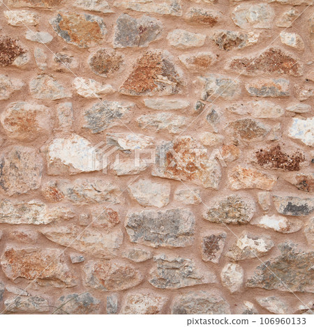 Sturdy yellow and beige cut stone wall made in Datca, Turkey, seamless lined up Sturdy yellow and beige cut stone wall made in Datca, Turkey, seamless lined up 106960133