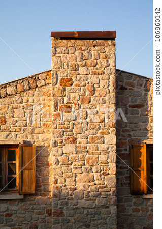 Solid and nostalgic stone houses typical of the Old Datca region, Turkey Datca Mugla June 26 2023 Solid and nostalgic stone houses typical of the Old Datca region, Turkey Datca Mugla June 26 2023 106960142