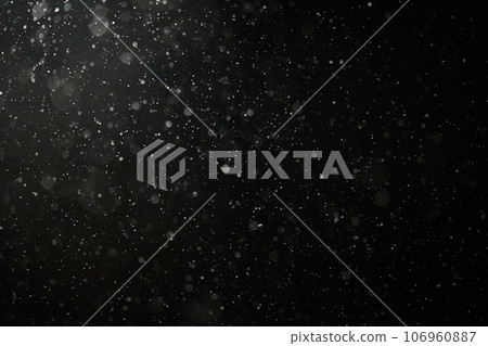 White snow isolated on dark background. Snowflakes falling down. Overlay effect for winter composition White snow isolated on dark background. Snowflakes falling down. Overlay effect for winter composition 106960887