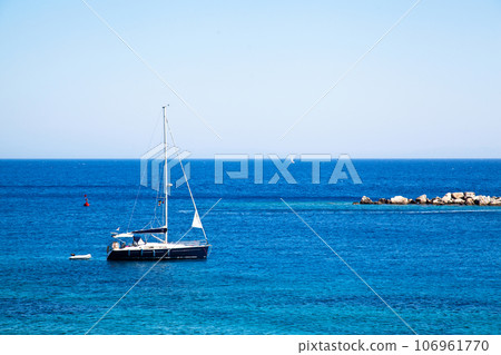 Yachts and ships waiting at the ancient city port of Knidos are on vacation.Turkey Mugla Datca, June 28 2023 106961770