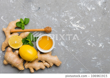 Natural cold and flu home remedies. Natural ingredients for immunity stimulation and viruses protection. top view flat lay Natural cold and flu home remedies. Natural ingredients for immunity stimulation and viruses protection. top view flat lay 106961915